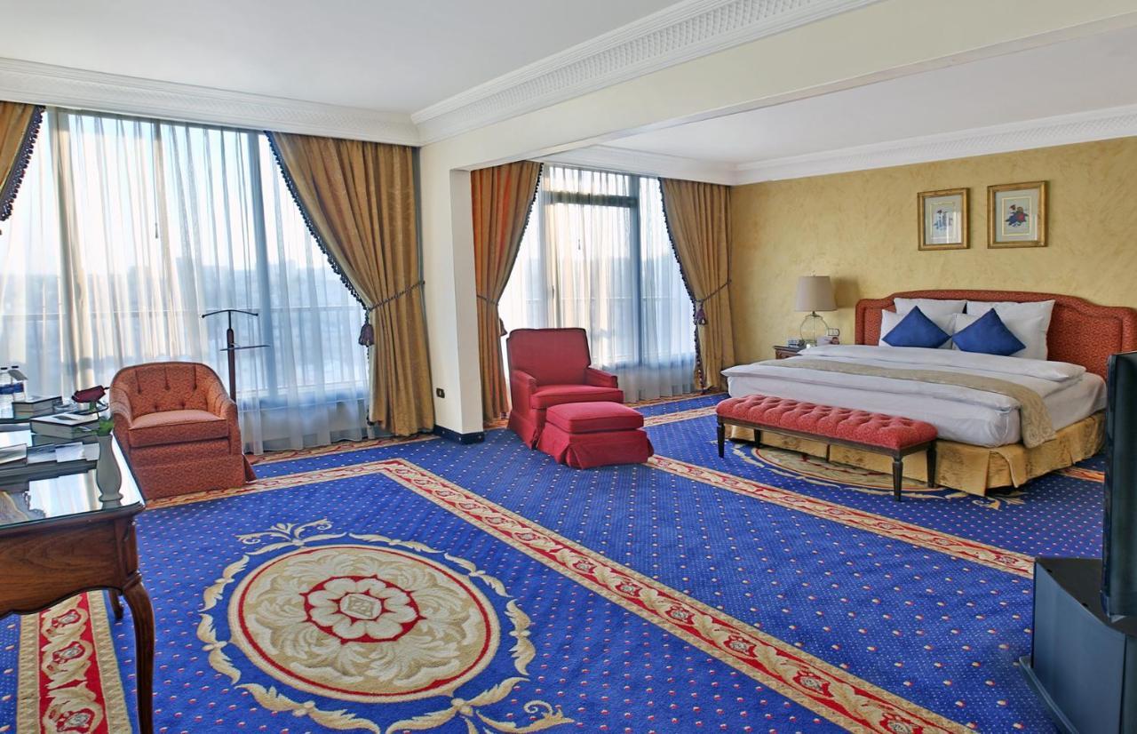 Regency Palace Амман Екстер'єр фото A bedroom at the Grand Hotel